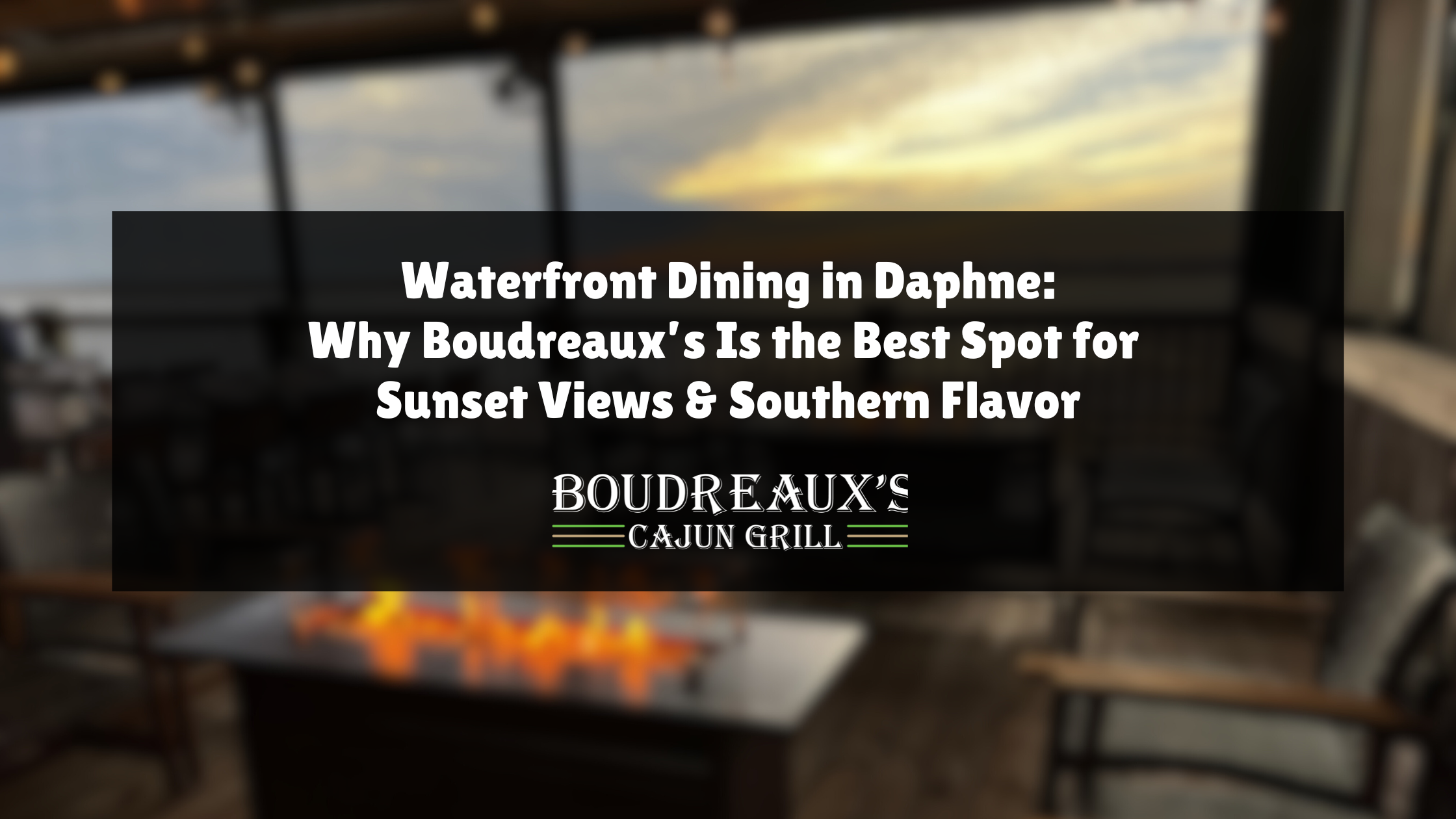 Waterfront view of Mobile Bay with sunset at Boudreaux’s Cajun Grill in Daphne